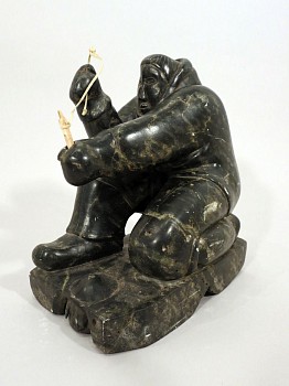 Work:&nbsp;Kneeling hunter at seal hole