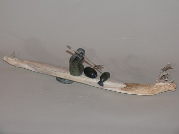 Works:&nbsp;Hunter in kayak with caribou swimming ahead and astern