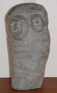 John Kavik, Mother with child, ex coll. William Johnstone
6 1/8 x 2 3/8 x 3 1/4 in.
From "Tuvaq," by Ken Mantell:  "[I]t is hard not to detect a certain innate sympathy in Bill [Johnsone]'s tastes towards the artists of the Keewatin/Western Hudson Bay communities . . . where artists like . . . John Kavik . . . wrestling with the often extremely hard-to-work local stone available to them come up with artistic solutions of the most startling formal and powerfully expressive character . . . .  [Kavik's] much larger and apparently very early stone piece, Mother and Child, has a rough monumentality and quiet dignity about it that is very moving. pp. 195-7.
03521-2
