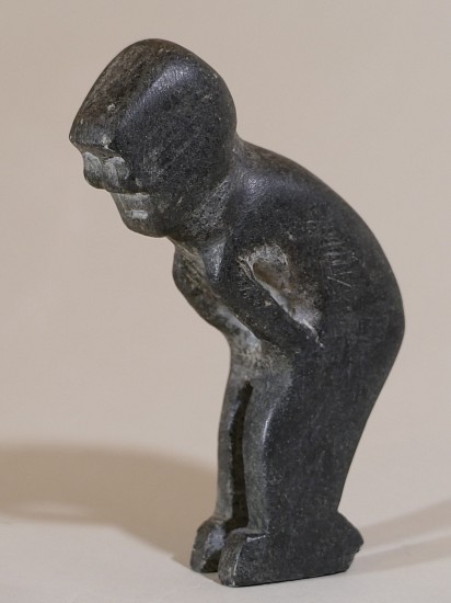 John Tiktak, Man leaning over
Stone, 4 3/4 x 1 1/4 x 3 1/2 in. (12.1 x 3.2 x 8.9 cm)
SOLD This charming small figure nevertheless exhibits classic Tiktak features -- the face with rounded cheeks and generous negative space between the arms and the body.  
03573-2